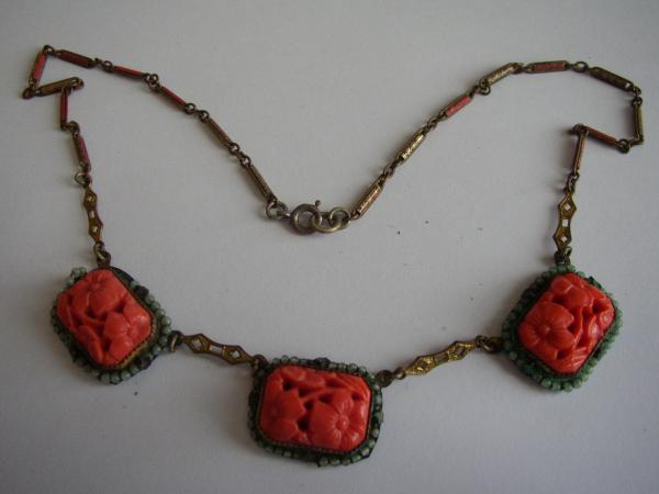 Carved orange coral or Jade necklace