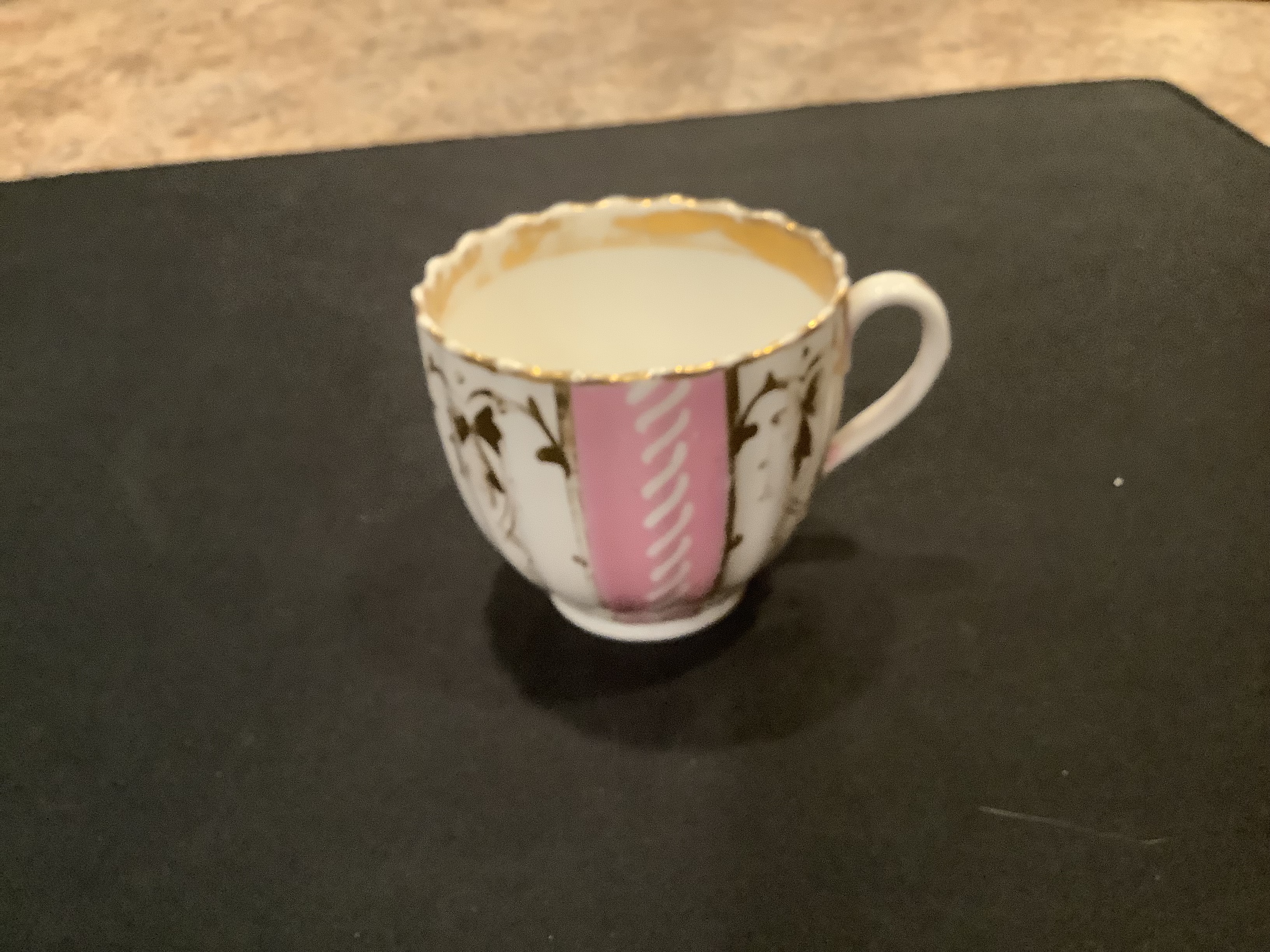 white, pink and gold teacup with saucer, again