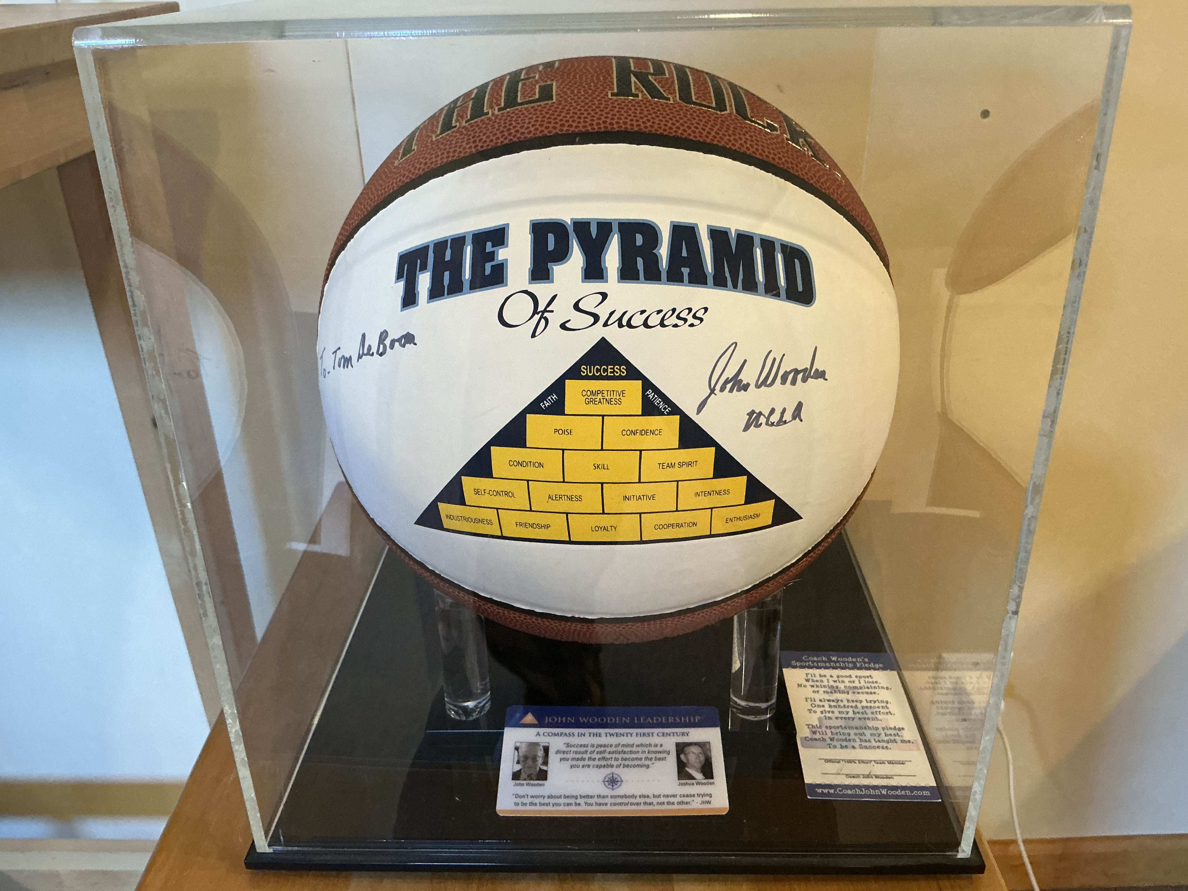 Sports memorabilia - John Wooden autographed basketball