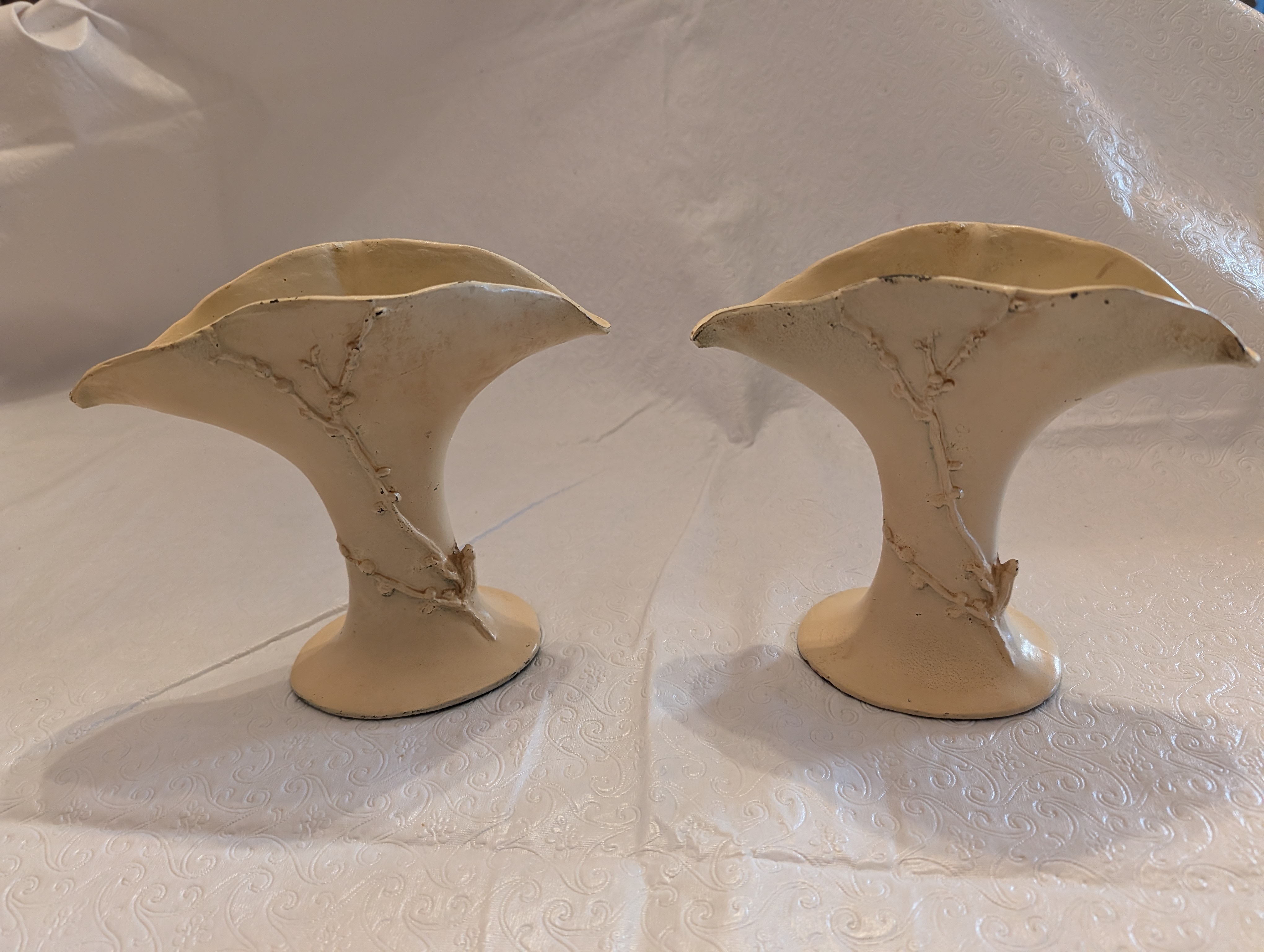 Cast metal vases with Ivory enamel by McClellan...