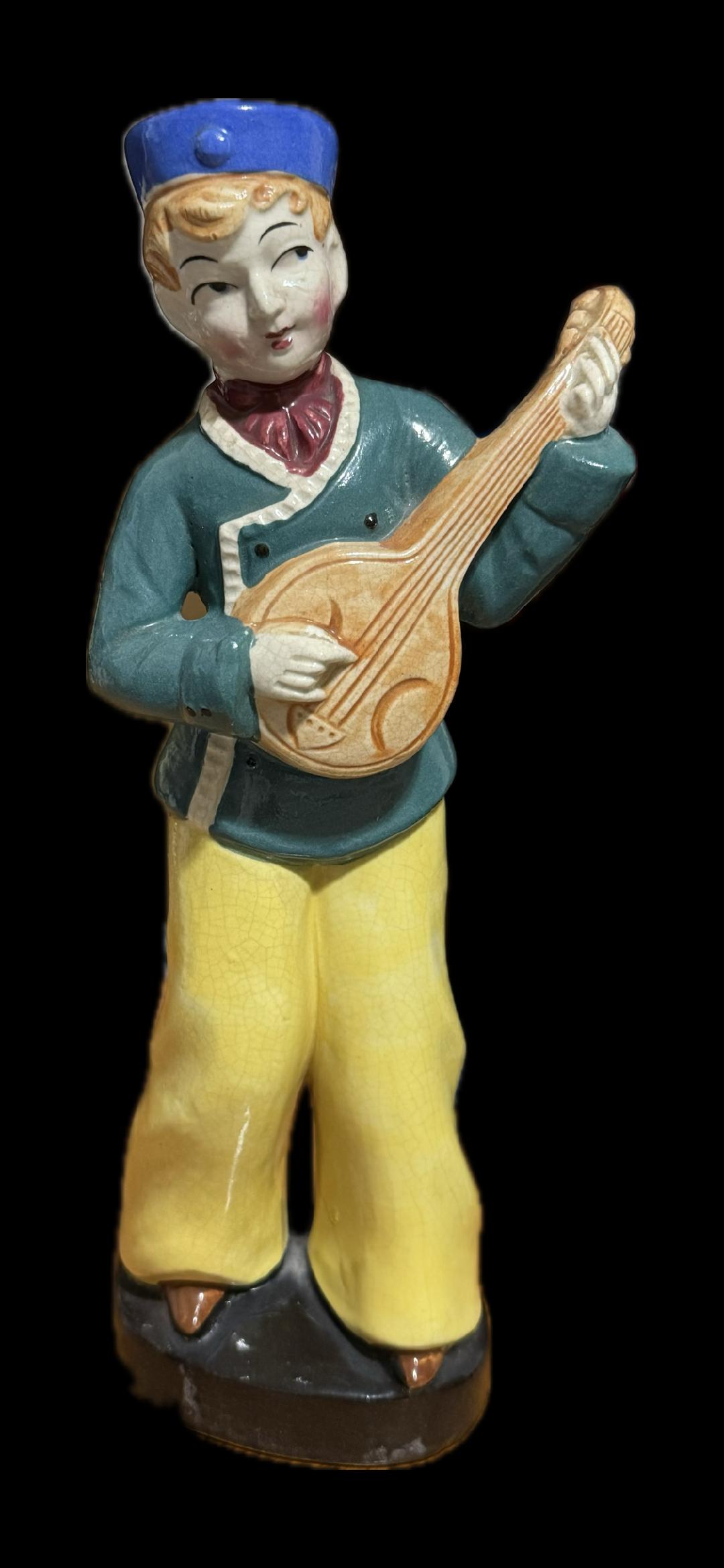 Figurine of a Male Playing a Shamisen