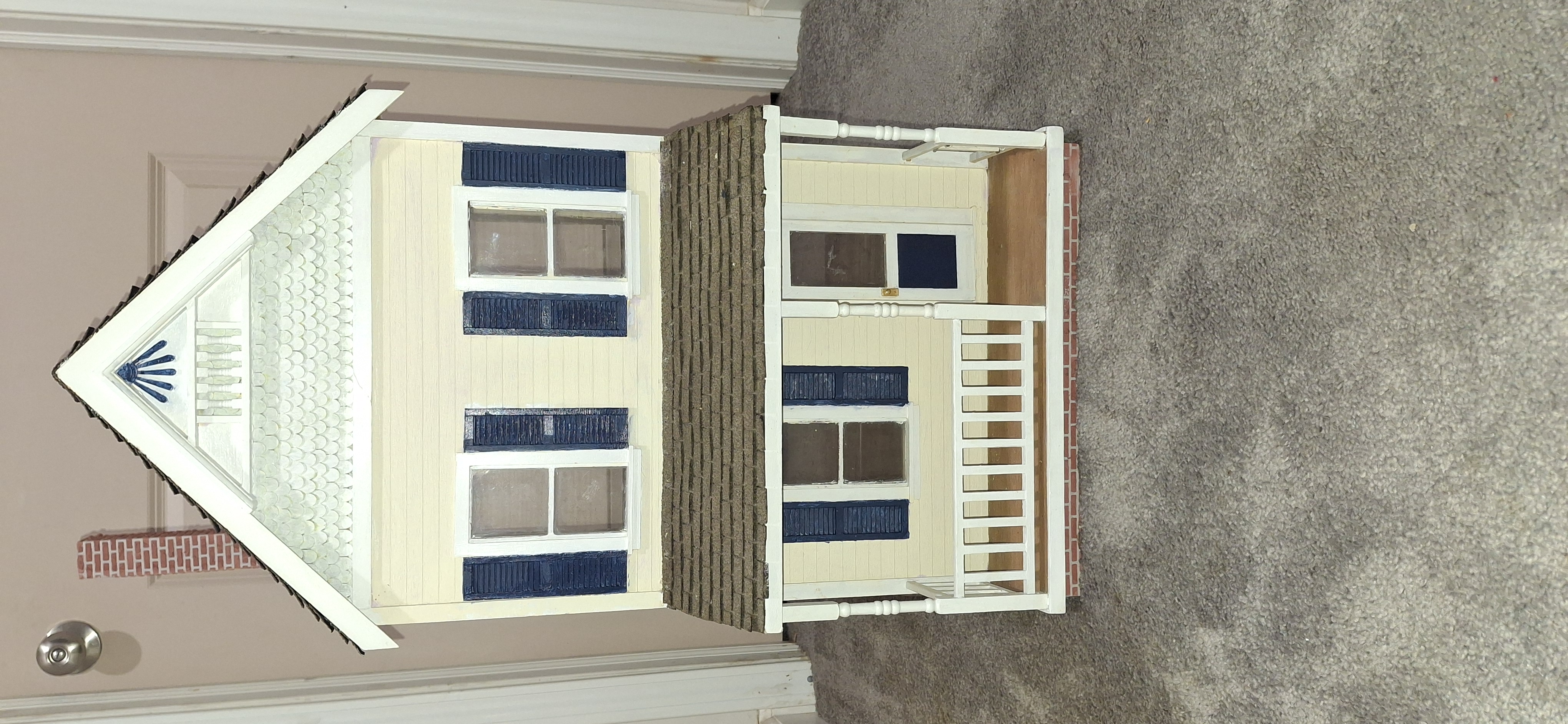 Hand‑built artisan dollhouse created, signed, and dated by miniature craftsman Jack Nash in 1994