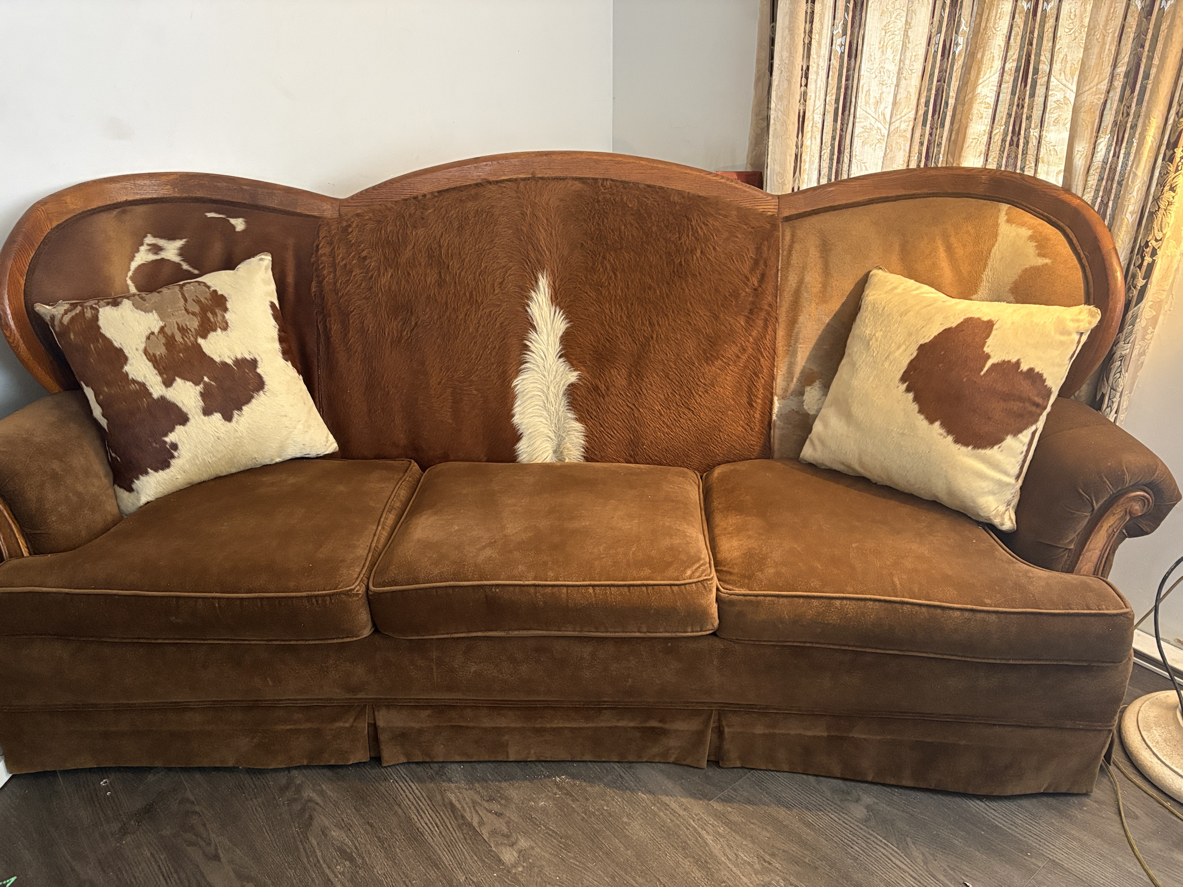 Antique cowhide couch with fur
