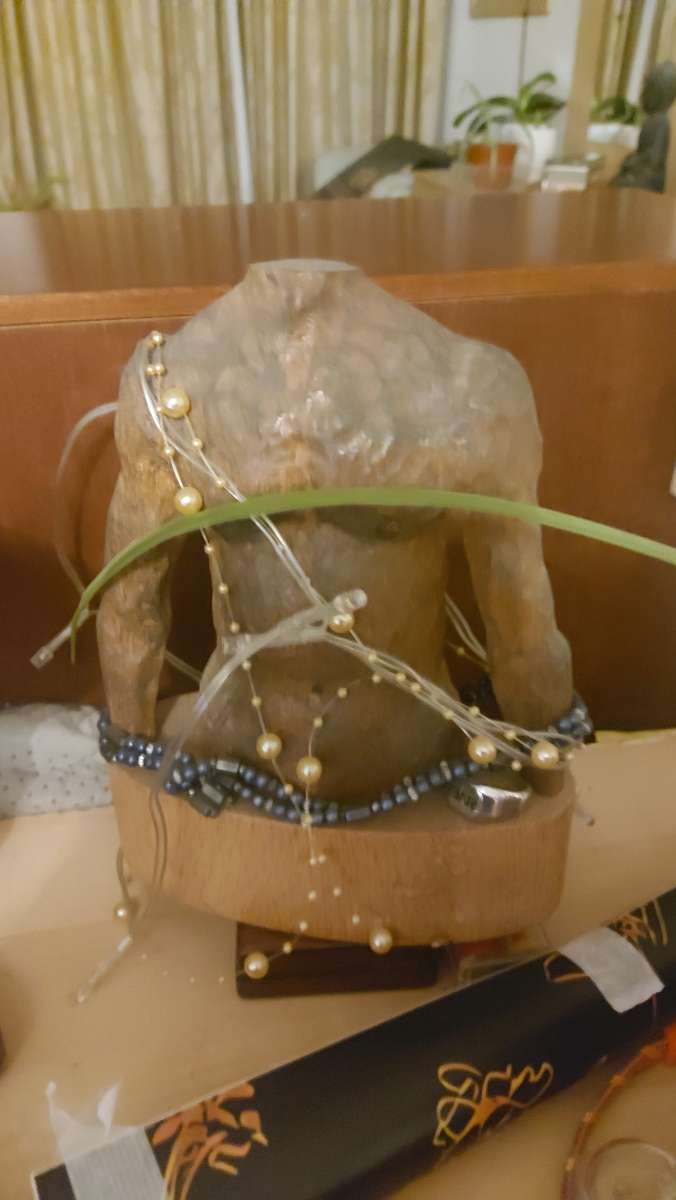 Artistic Sculpture with Beaded Accents