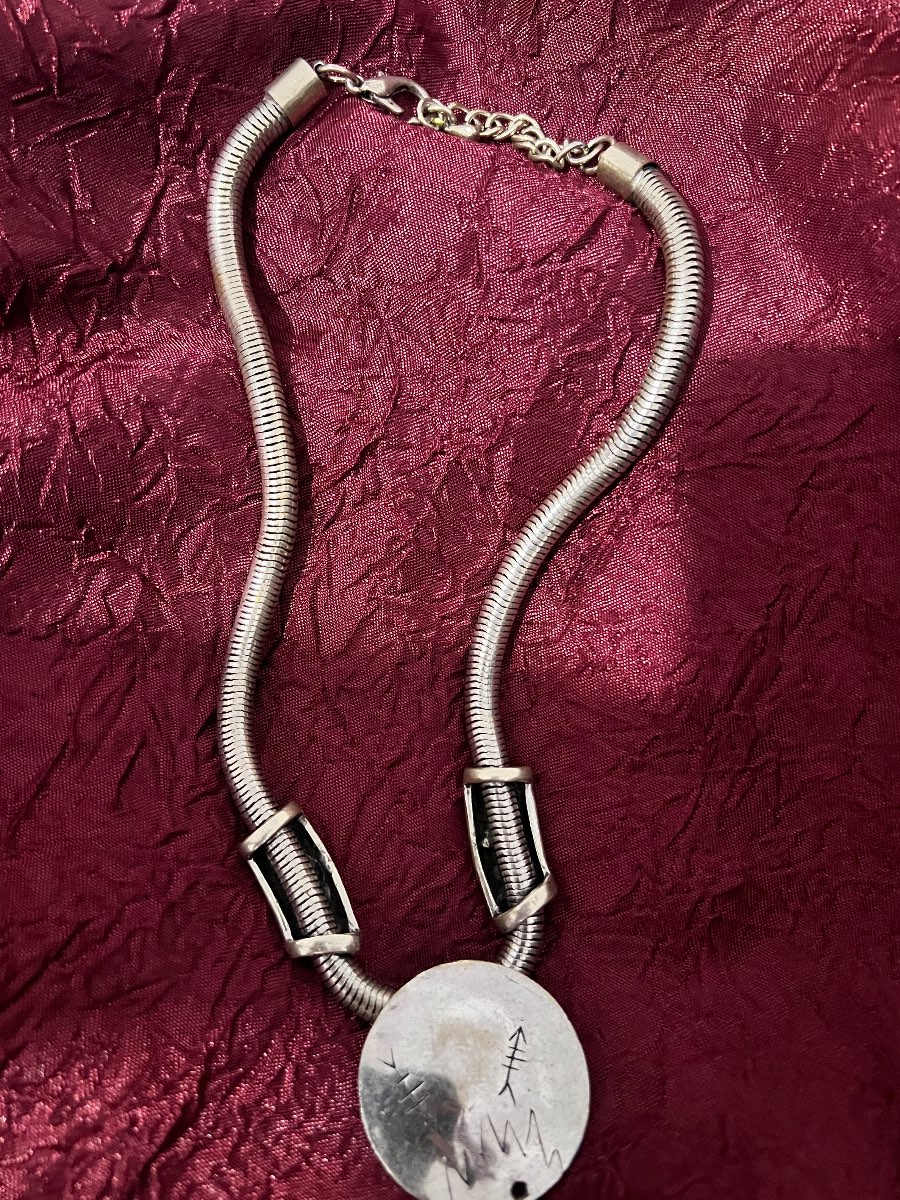 Silver Necklace with Engraved Pendant — appraisal value $150 - $250