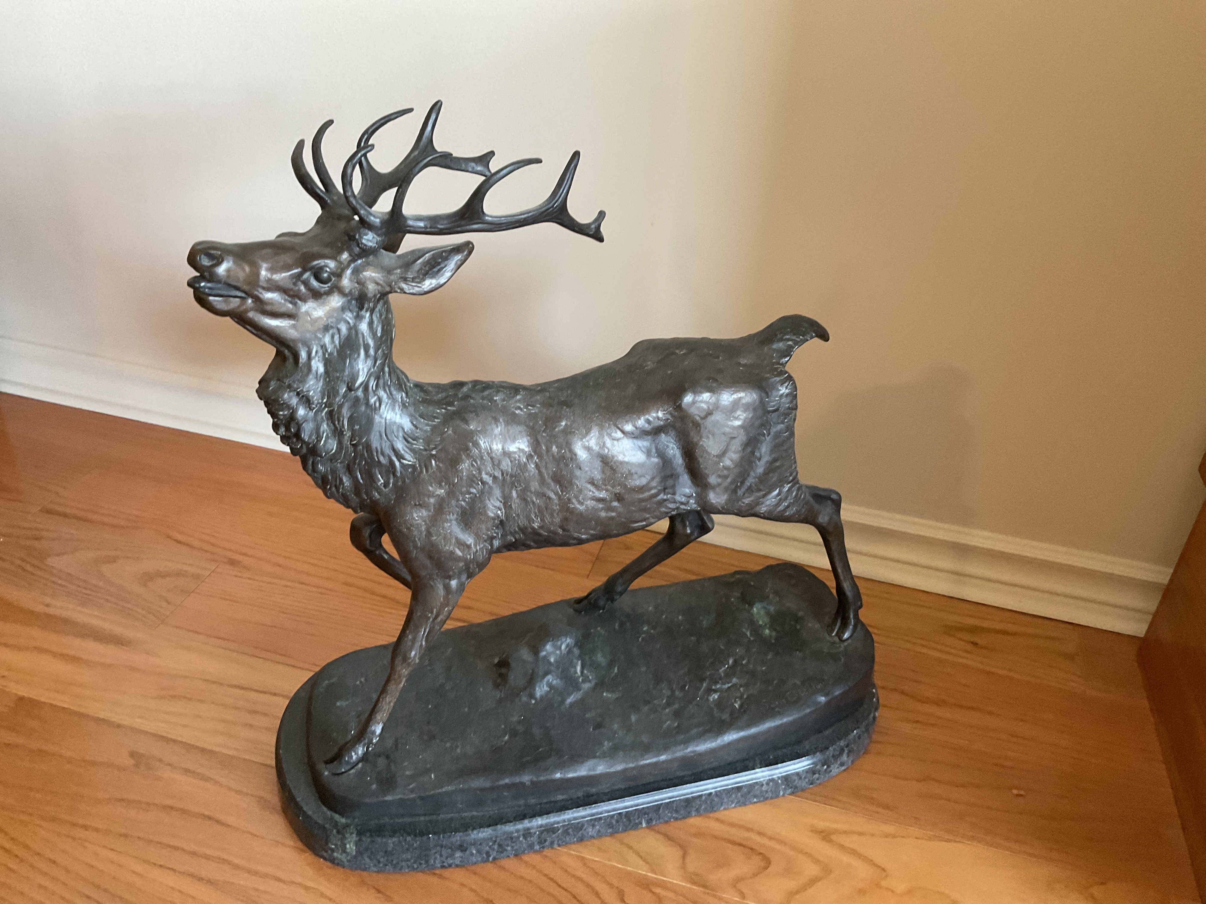 Bronze statue of a deer by Antoine Louis Barye (1795-1875) . 20.7” x 19.7”