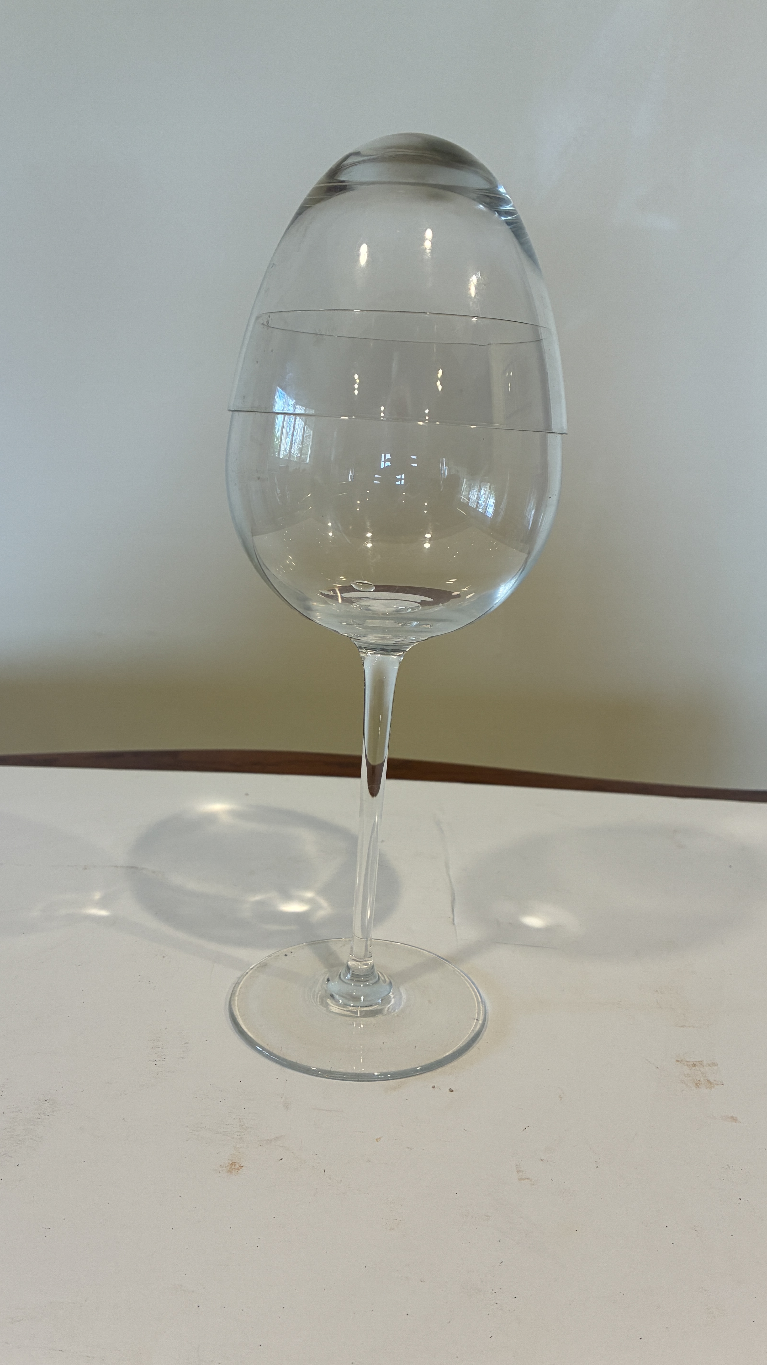 12" high wine glass withh egg top. From Germany in 1969. No marks or damage. Other item is 16" high with ground glass top. No marks or damge. From family estimated in lare 1800's.