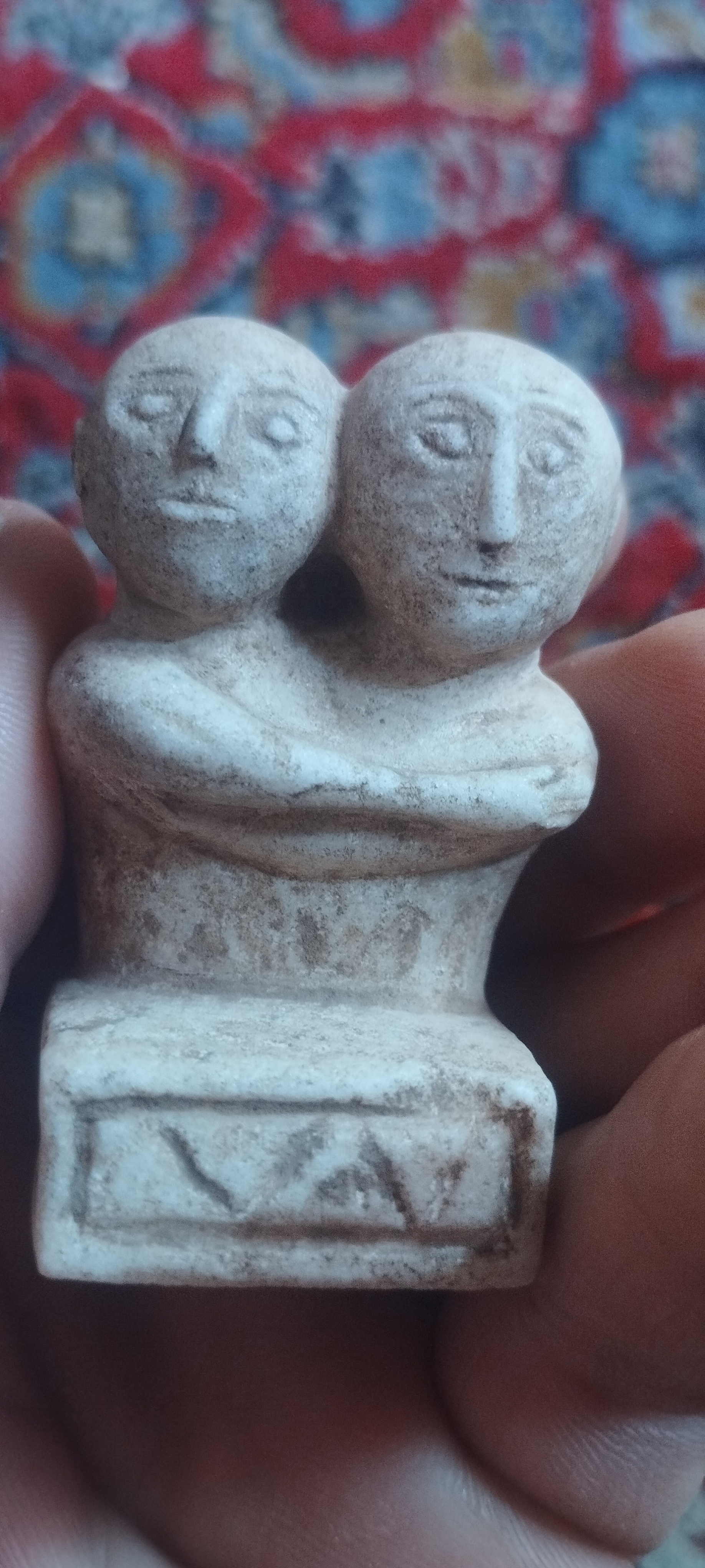 Stone Sculpture of Two Figures