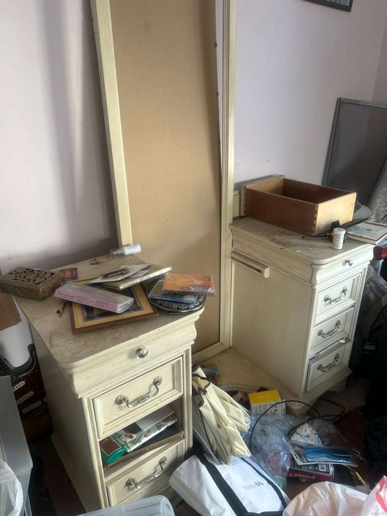 dresser with mirror panel in the middle