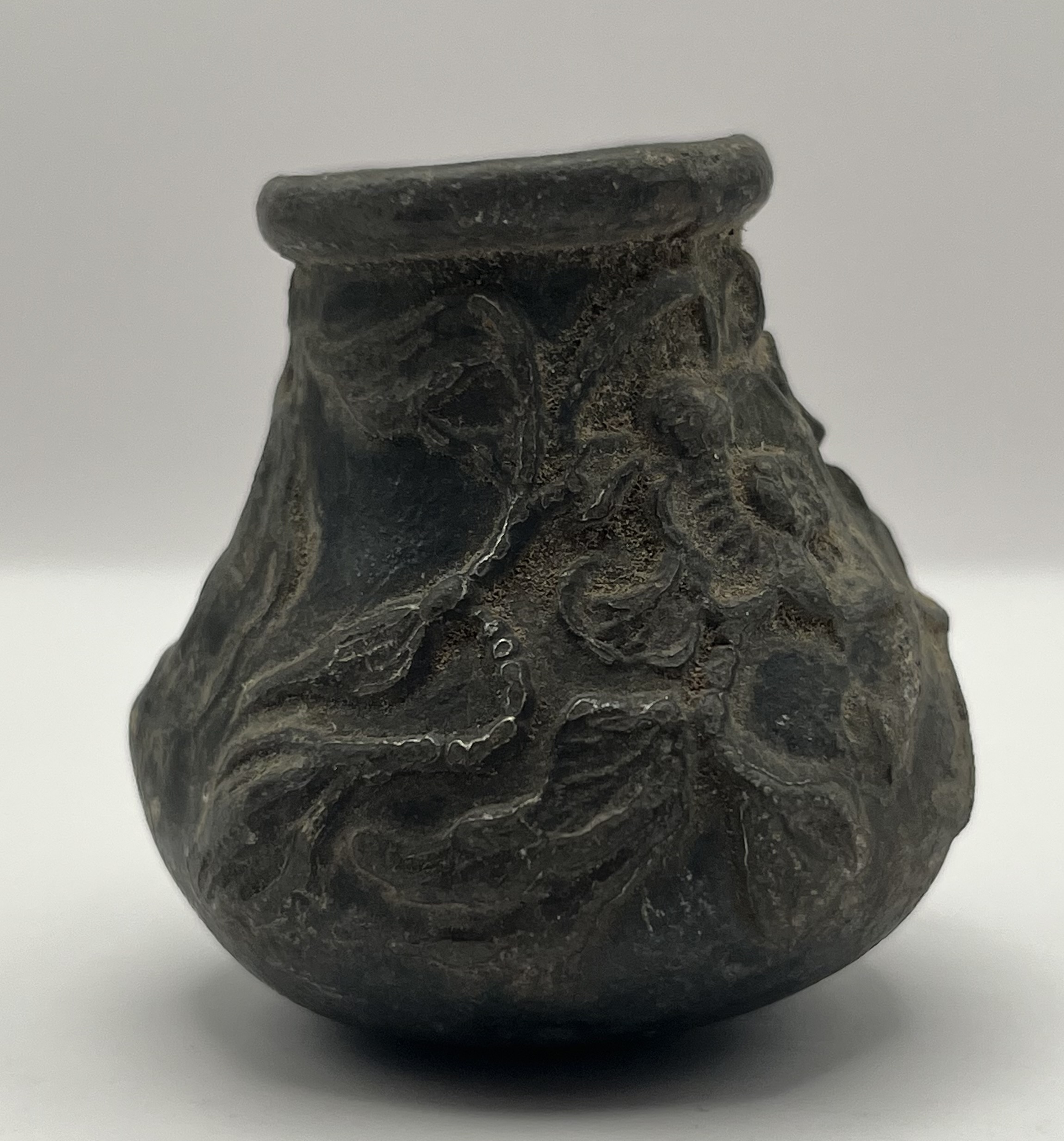 I think it could be a pilgrim flask. 