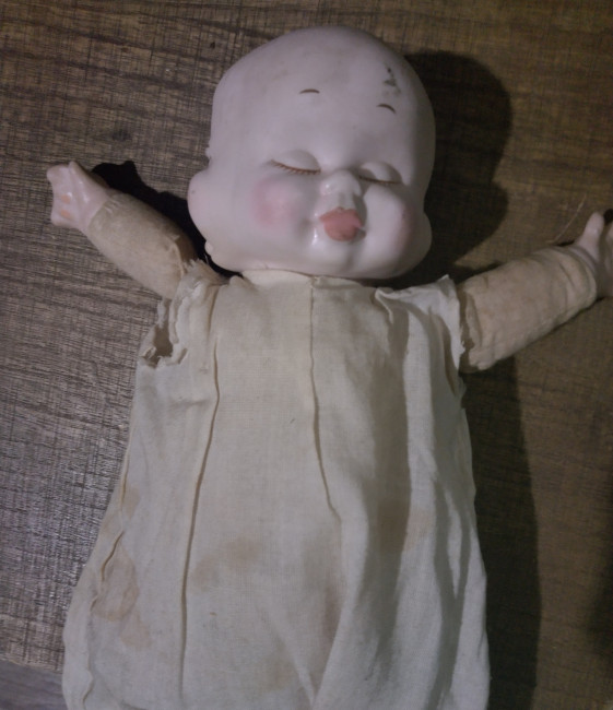Porcelain 3 Faced Doll