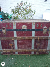 Antique Trunk with numbers painted yellow on the bottom