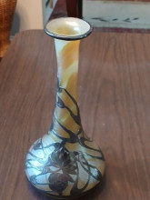 8.5 inch hand blown vase with multi-color iridescent finish, decorated with silver overlays possibly a loetz from austria.  Impressed on Bottom - 202/202, Phen, B - difficult to read - need a magnifying glass.. 