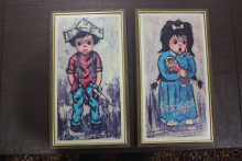 Two Framed Prints of Wide Eyed Boy and Girl