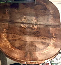Ornate walnut burr dining table