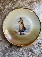 German plate with painting of Dutch woman 