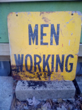 Men Working Sign 