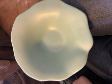Signed green pottery bowl