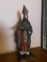 wooden statue of a saint