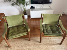 A pair of Arne Norell Sirocco safari chairs in olive green and rosewood 
