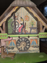 Vintage Cuckoo Clock with Spinning Wheel Scene