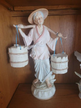 vintage set of porcelain chinese man and woman carrying water buckets