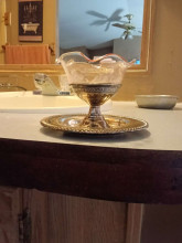Looks like a sorbet serving ensemble. Silver base and cut Crystal bowl