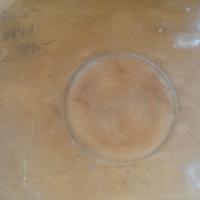 back has illegible marks