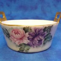 this has a small plate inside with holes in it so I think this is a butter dis