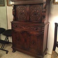 5 ' tall; full double door cabinet at top. full drawer across middle, full double door cabinet at bottom. Both cabinets have the original shelves. Excellent contition