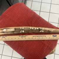 Fossilized walrus tusk with dog-team carving circa 1940s no chips or scratches