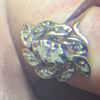 1940s-1950's white gold floral setting marquise center diamond 8 accent diamonds