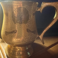 Brass mug with peacock engravings give to me fromMy grandmother brought back fromJapam