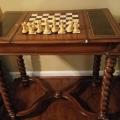 Vintage/antique Chess Game table with chess pieces.