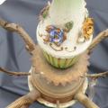 Vintage chandelier with pendants and ceramic flowers