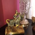Bronze jousting knight on marble platform