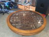 Table top that is hand carved and the glass is extremely heavy, and beveled.