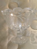 Lead Crystal from Europe.  Approx. 5-6" high.  Scalloped upper edge.