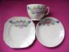 Old cup, saucer and plate